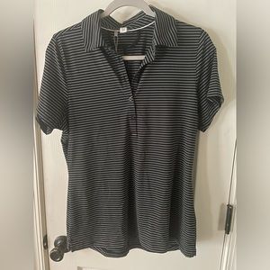 NWT Women’s size large Under Armour short sleeve top black/white stripe